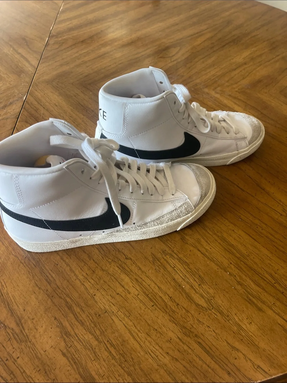 Nike Size 8 White High-Top Sneakers with Black Swoosh